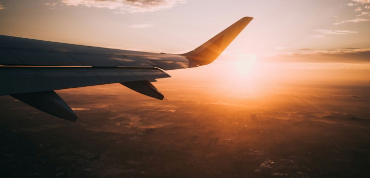 airplane on sky during golden hour